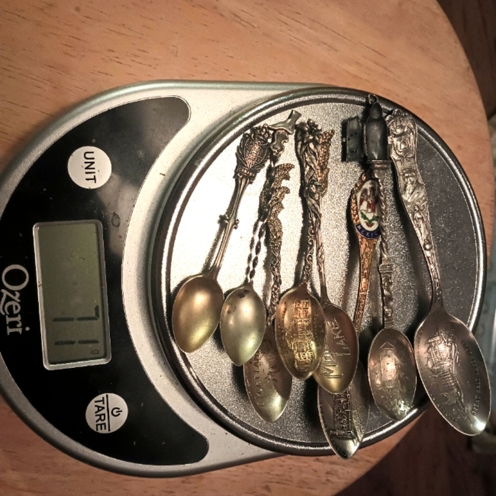 Sterling silver miniature spoons.